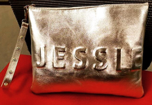 Embo zipper clutch